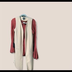 Long cream vest